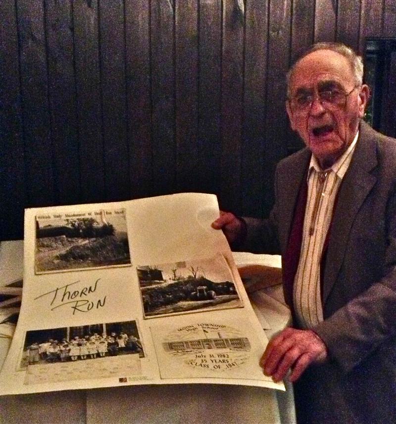 IMG_0957.61123503_std After the meeting was over, many guests visited the huge display of old photographs collected by this well-known fellow to Moon Township residents. Thank you, John Kennedy!