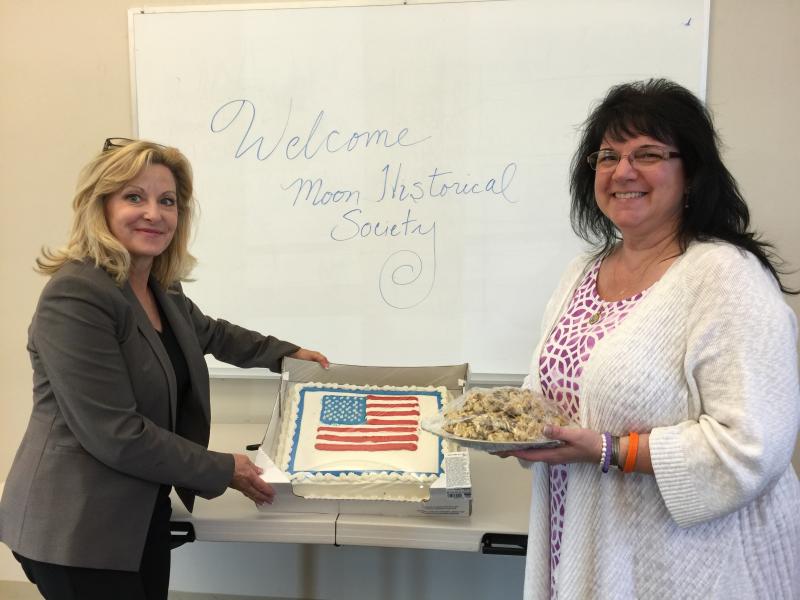George14.245165900_std Speaker Series-Co Chair Amy Ottavinia and Secretary Patty Zerishnek show the patriotic theme they had for this evening's social hour.